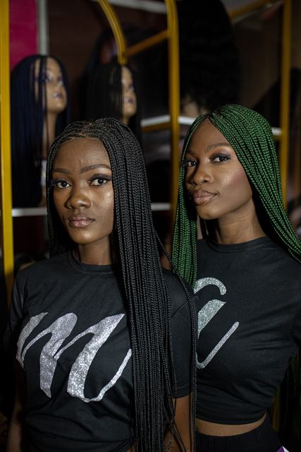 Knotless braids in black and green